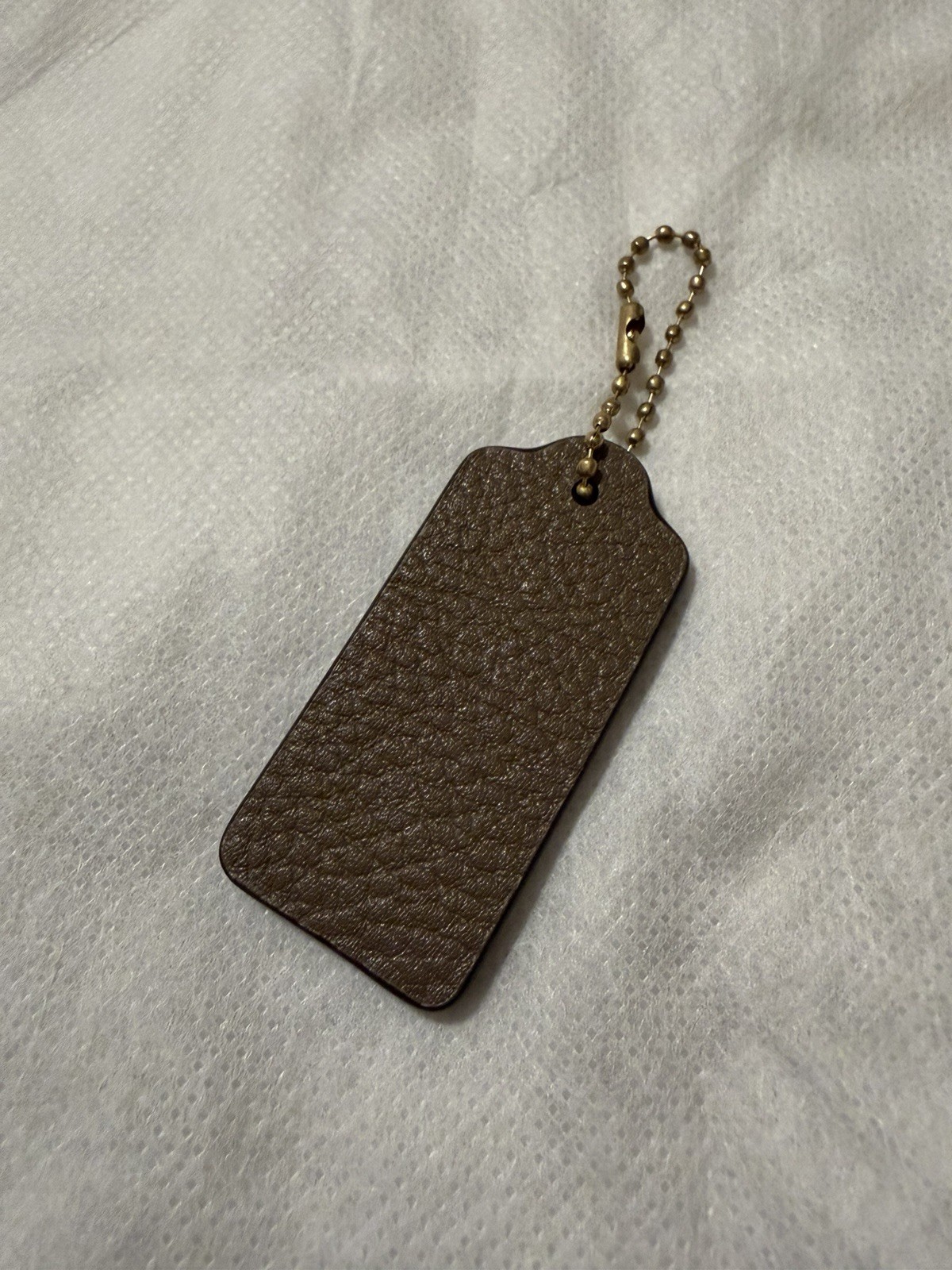 Coach Hang Tag