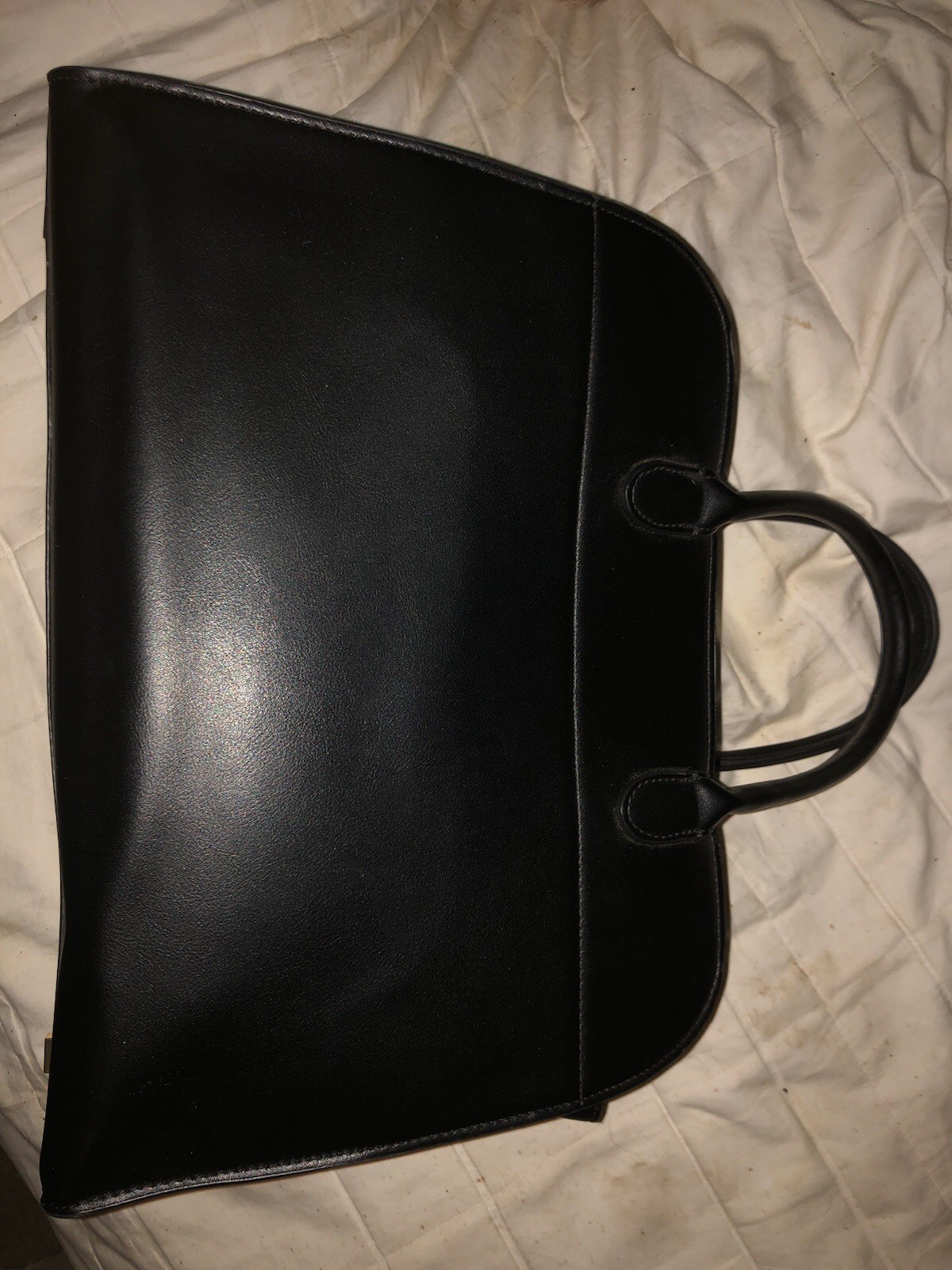 The Row Margaux 15 black with gold hardware