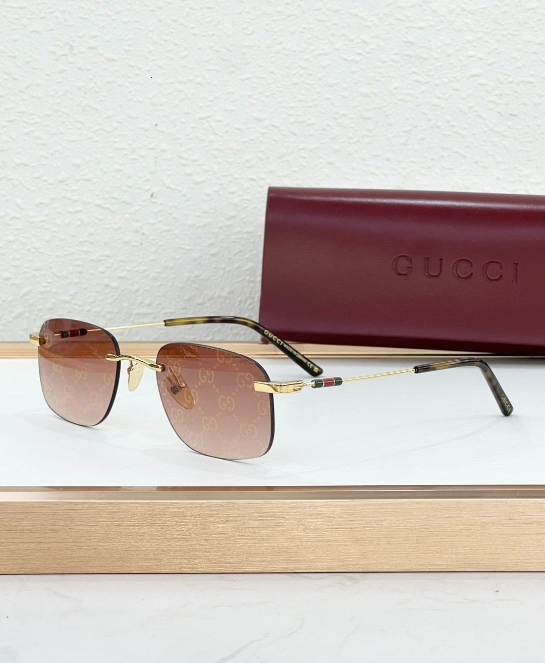 Gucci Rimless Square Sunglasses Gold Metal Frame Brown GG Printed Lens NEW