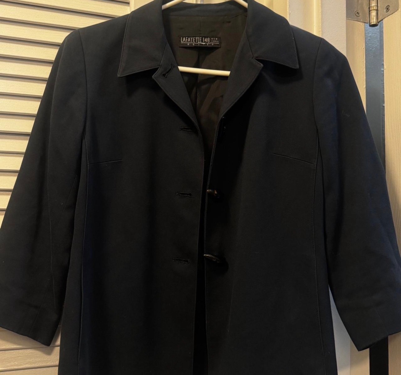 Vintage Lafayette 148 New York navy blue tailored jacket in size 4 Petite.