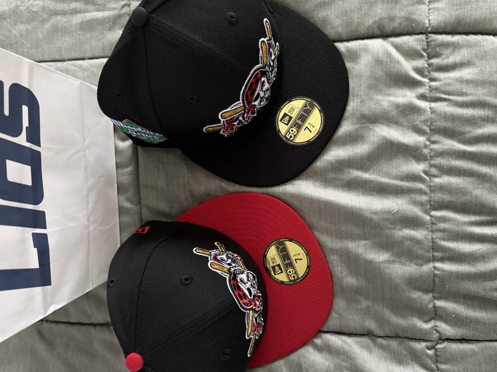John geiger misplaced series pirates red brim and black bundle size 7 3/4