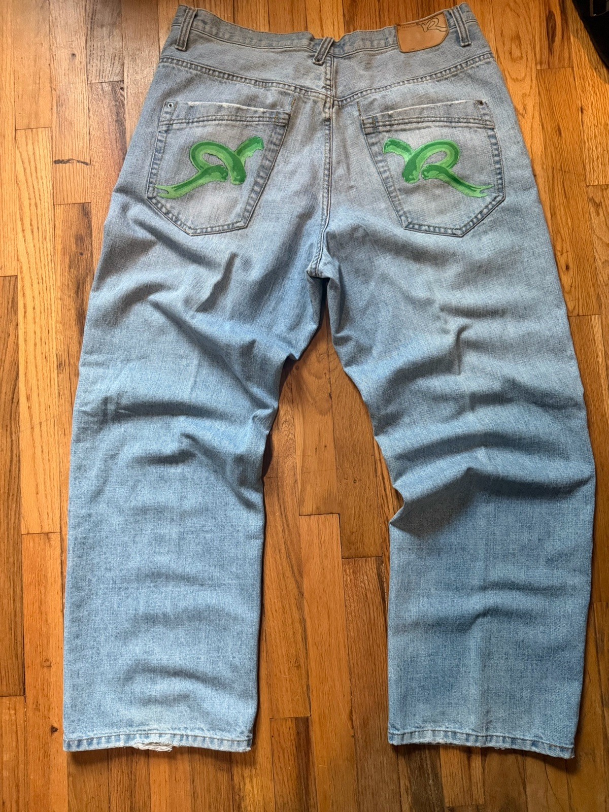Men’s Light Wash Blue Solid Denim Jeans Logo Accents 5-Pocket Design