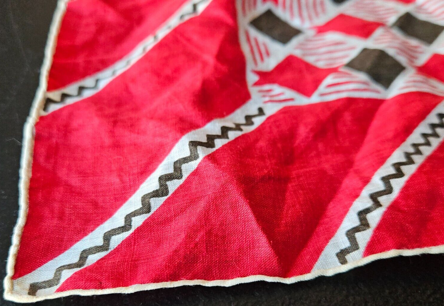 RED, BLACK, WHITE MULTI DESIGN EMBROIDERED EDGE HANDKERCHIEF. 12 1/2 IN.
