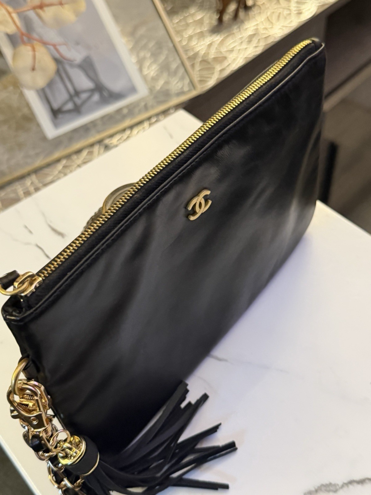 CHANEL Black Quilted Zip Clutch Wrist Strap Chain Tassel Gold CC Logo