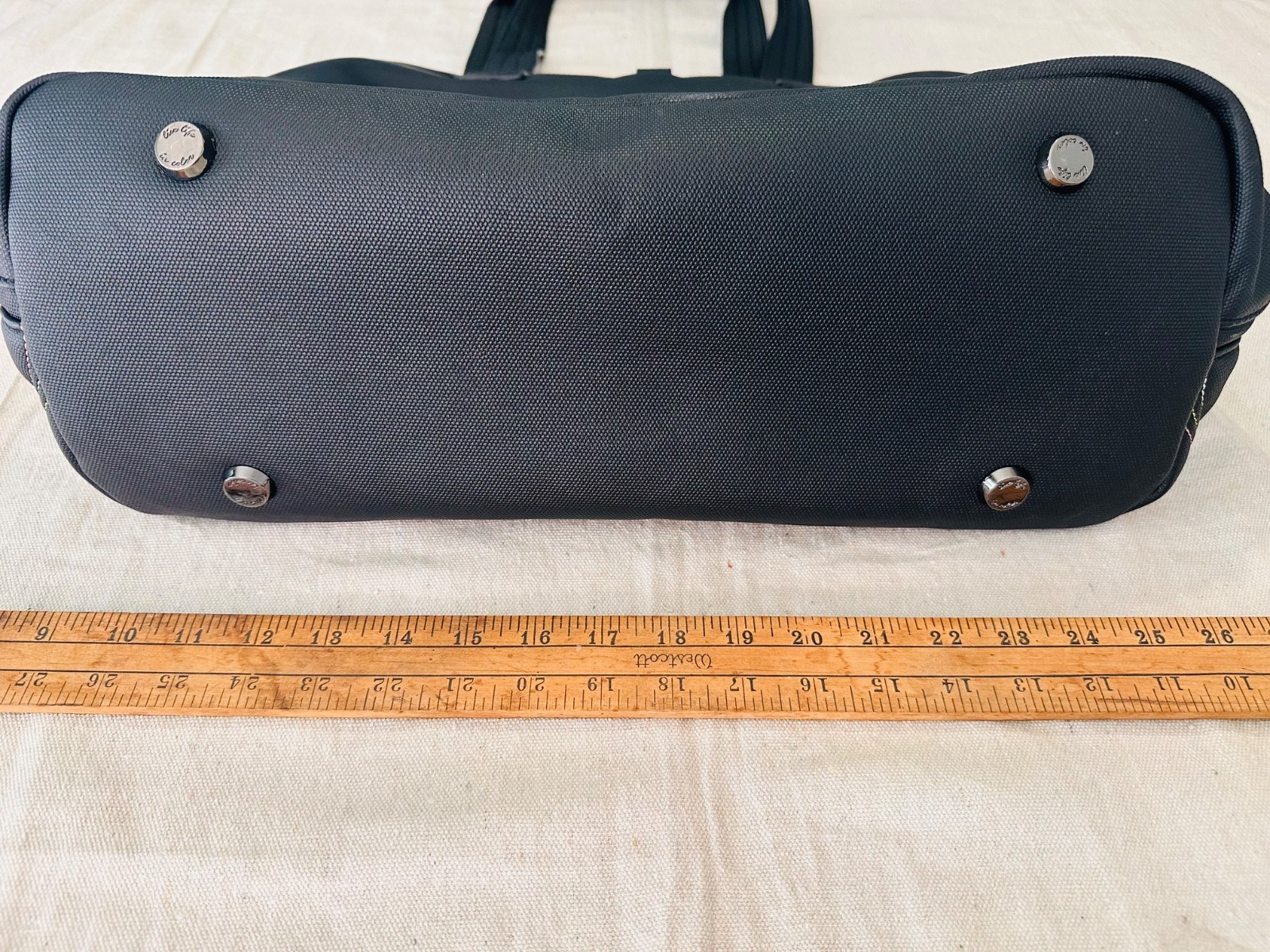 black lug handbag multicolored wavy stitching. Multi functional / very spacious