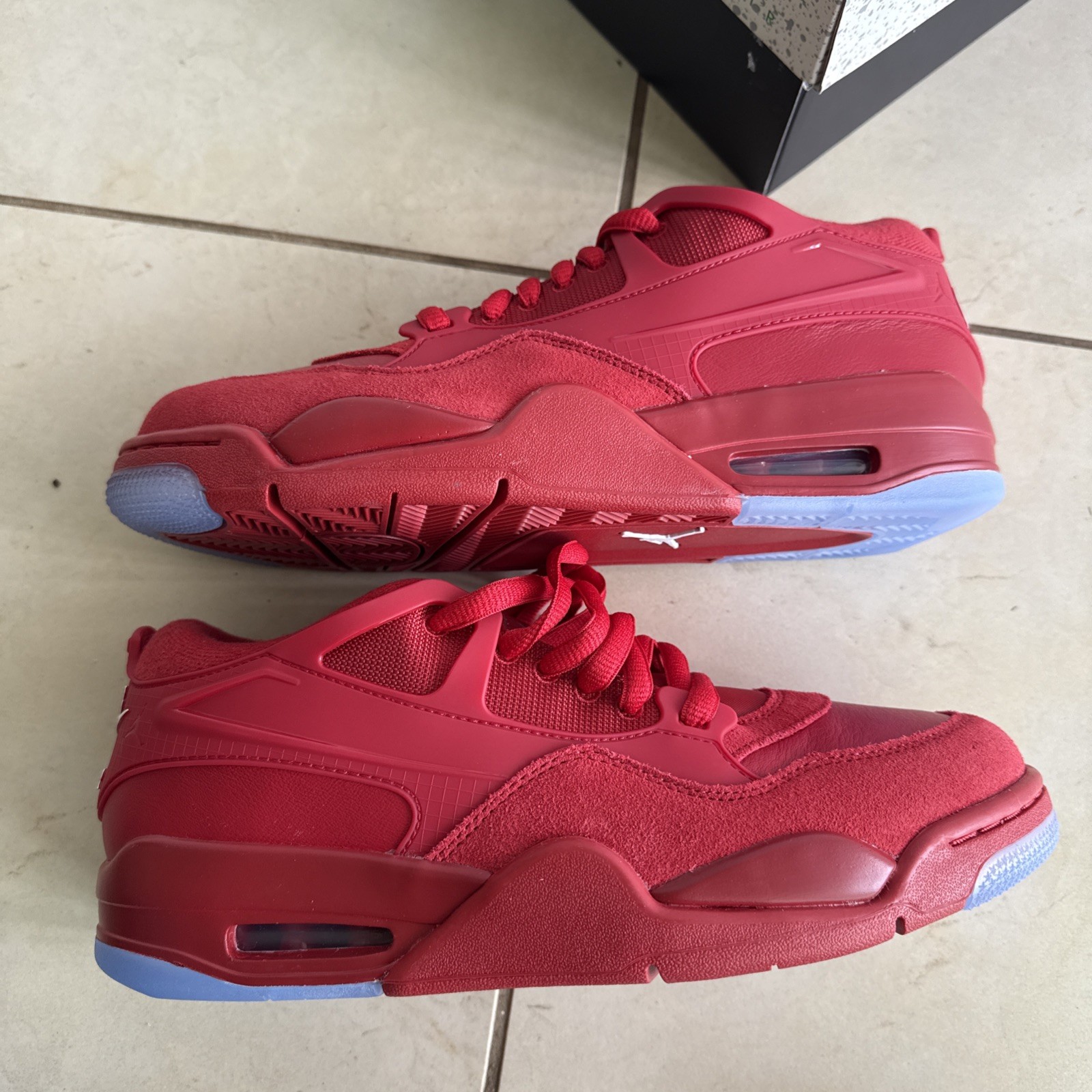Size 9.5 – Air Jordan 4 RM Varsity Red