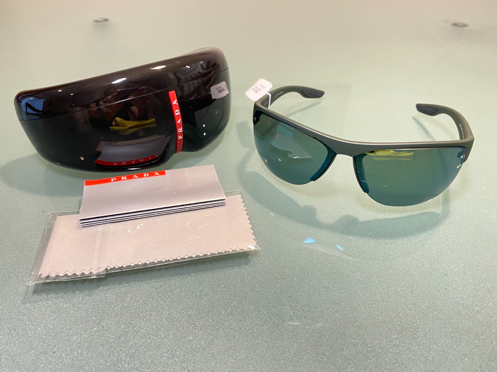 Prada Linea Rosa Sport men’s sunglasses, flat black frame, made in Italy, new.