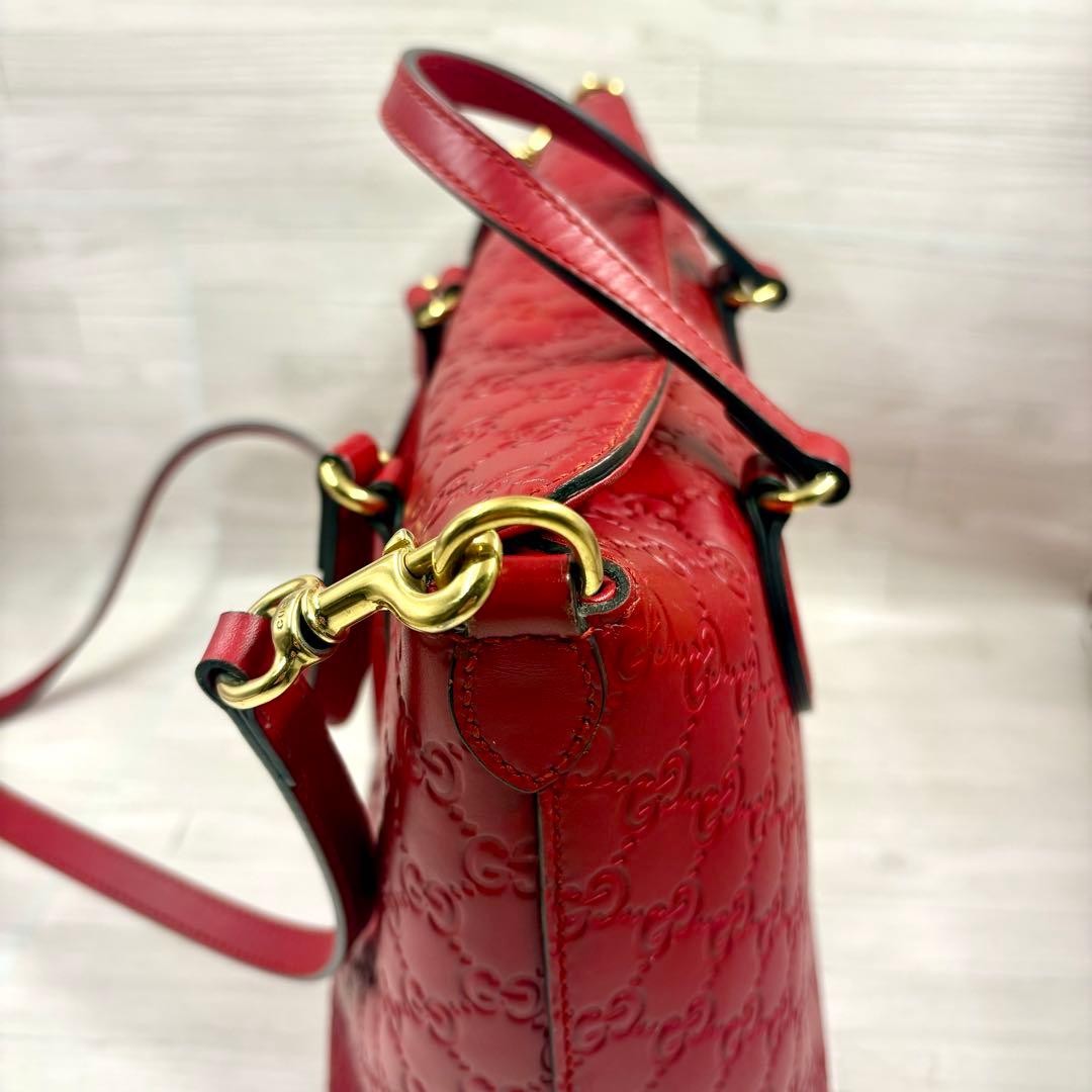 GUCCI Shoulder Bag Guccissima Red Leather Size: W11.4xH9.8 in. Strap: 43.3″