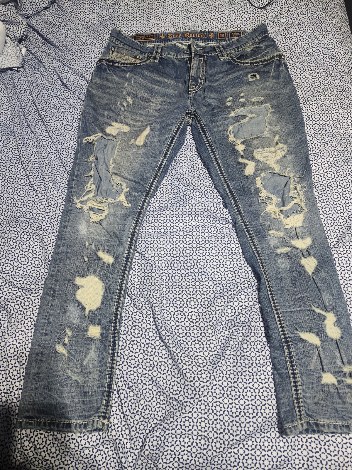 Rock Revival Men’s Medium Wash Blue Distressed Taper Jeans Embroidered Logo