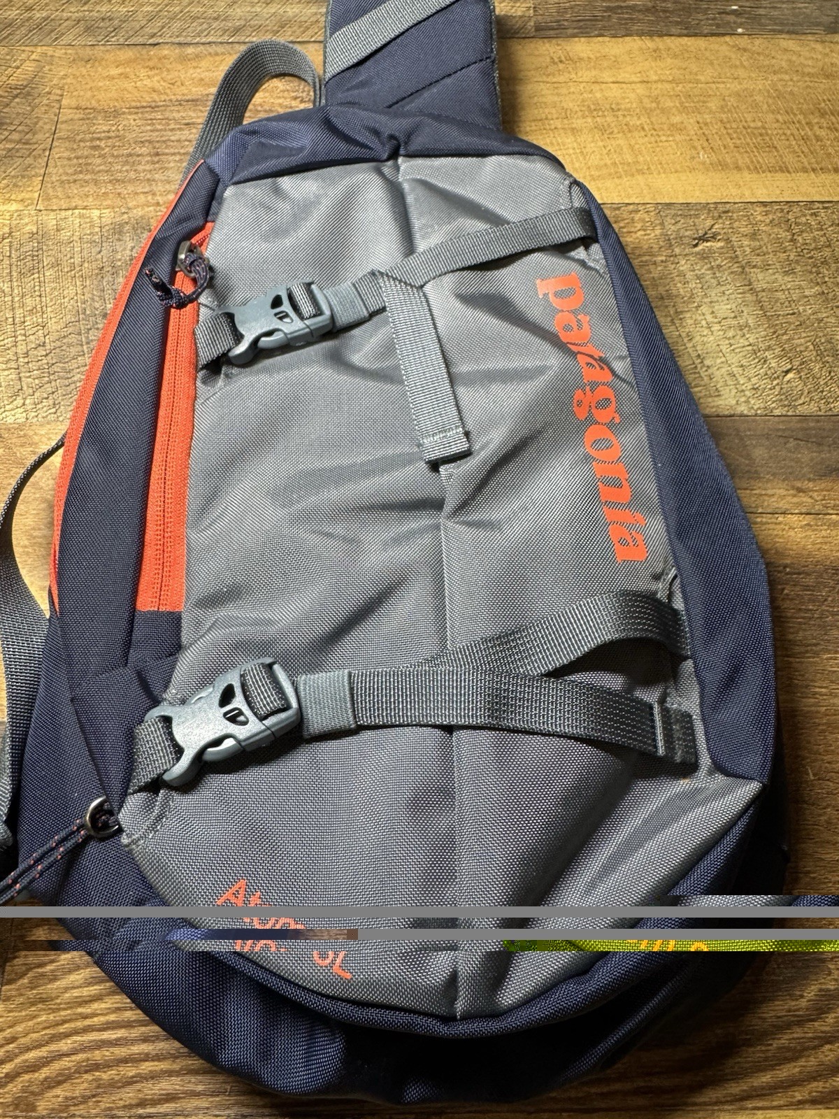 Patagonia Atom 8L Navy Sling Bag Outdoor Adventure Pack Orange Cross Body
