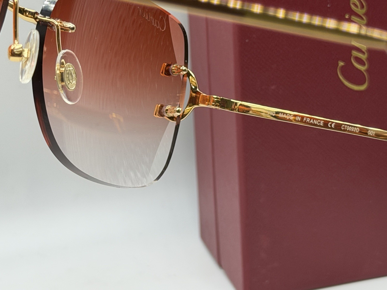 Cartier Rimless Square Gradient Red Unisex Sunglasses Gold Metal Frame CT00920