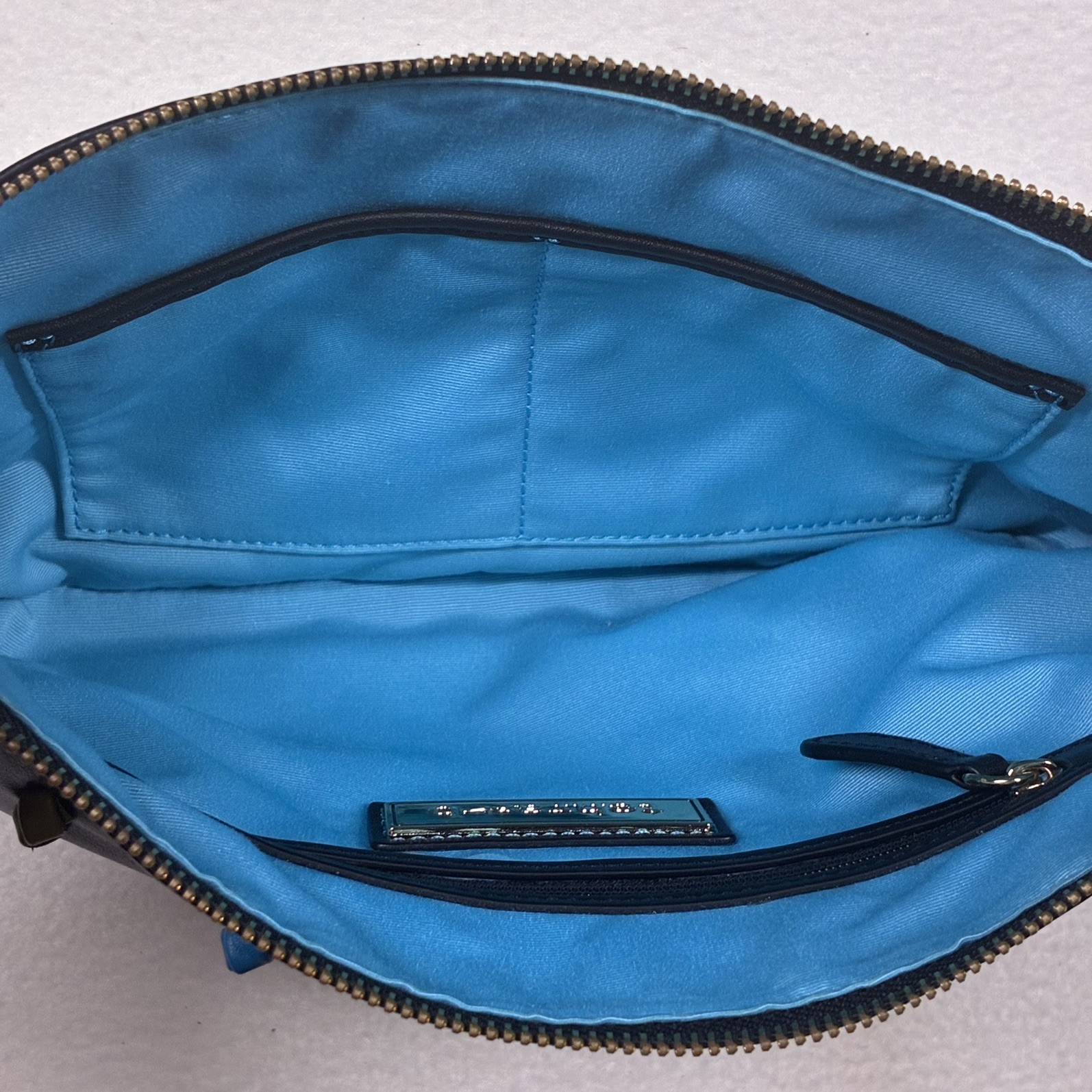 Tehra & B Black Leather Wristlet Clutch Hand-tied Signature Knots Blue Trim