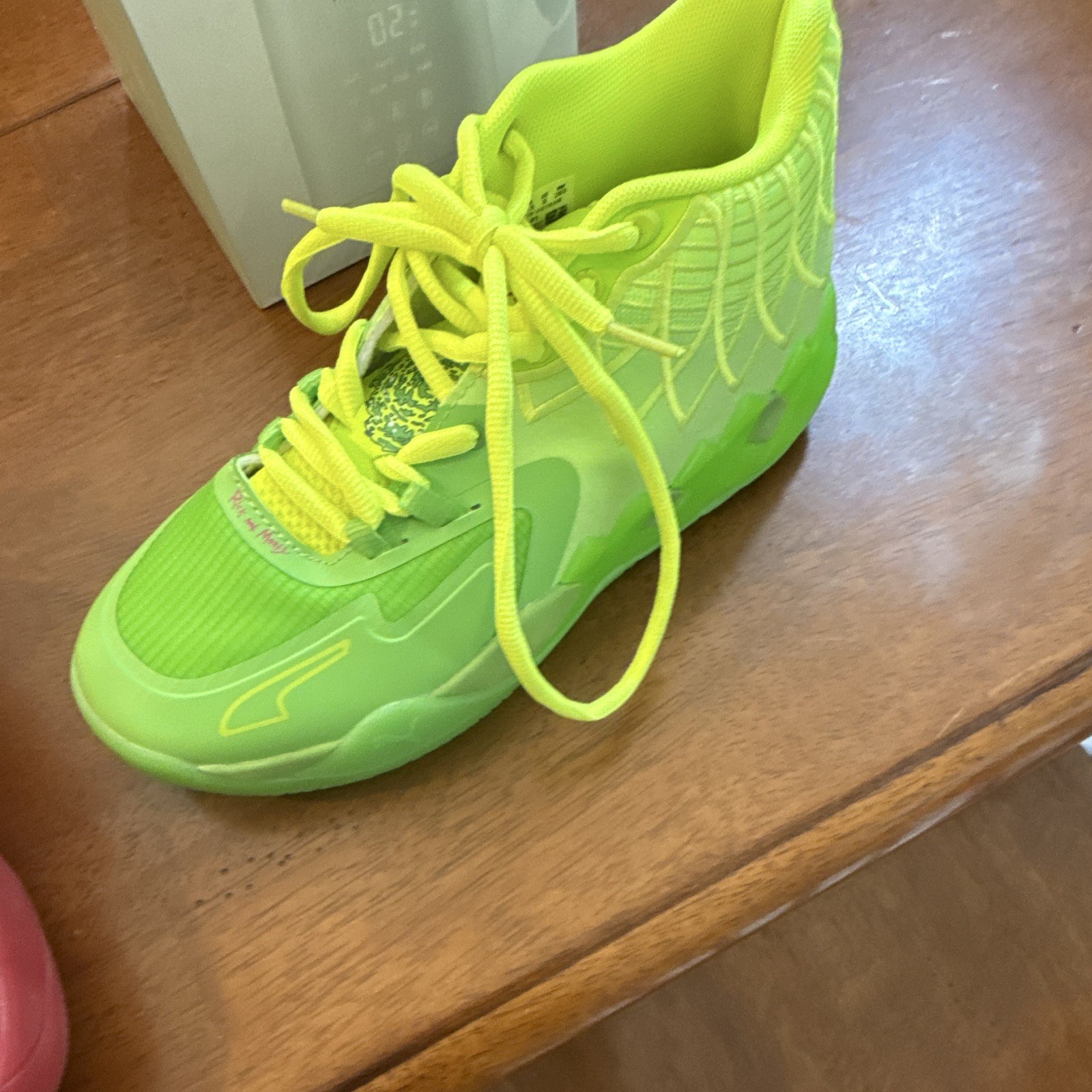 PUMA MB 01 Rick and Morty Mismatched Green/Red Colorblock Mid Top Sneakers