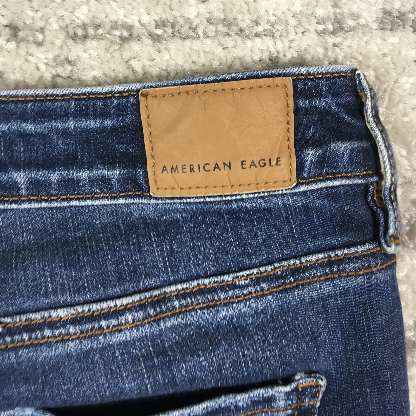 American Eagle Jeans Womens 4 Super Hi-Rise Jegging Distressed Raw Hem Blue