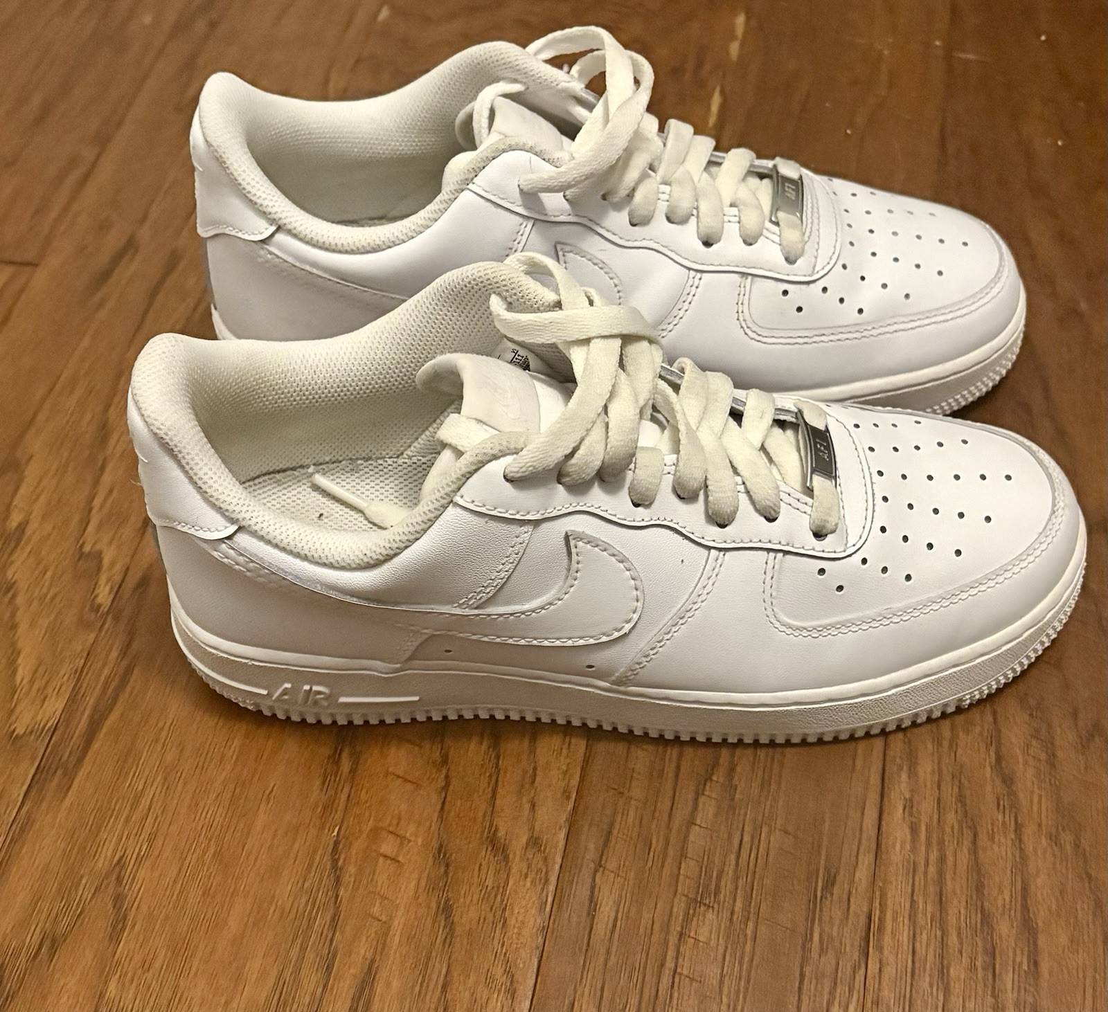 Nike Air Force 1 Men’s Low Top Lace-Up Athletic Sneakers Solid White