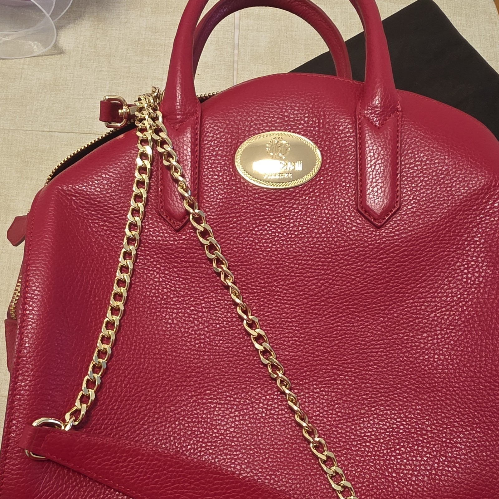 Roberto Cavalli travel bag, red, never used, in its shopping bag.