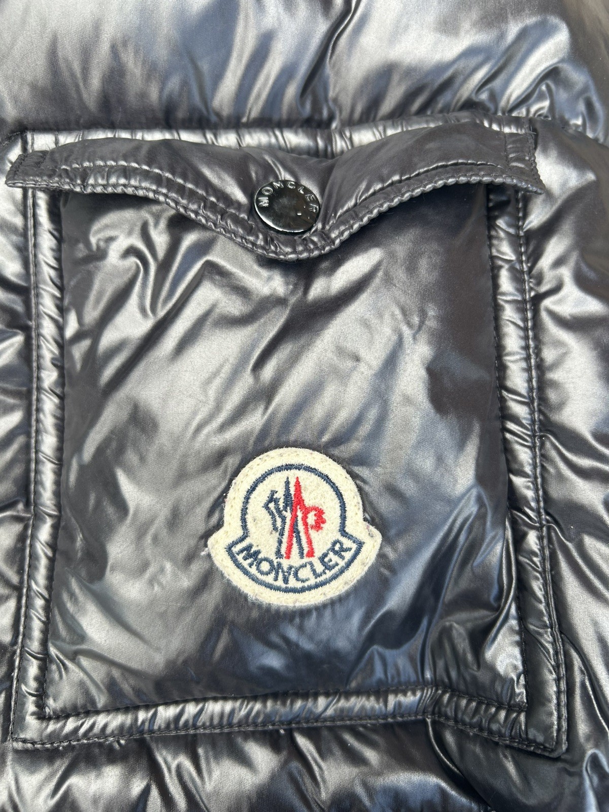Moncler Black Insulated Zip Up Puffer Jacket with Logo & Zipper Accents