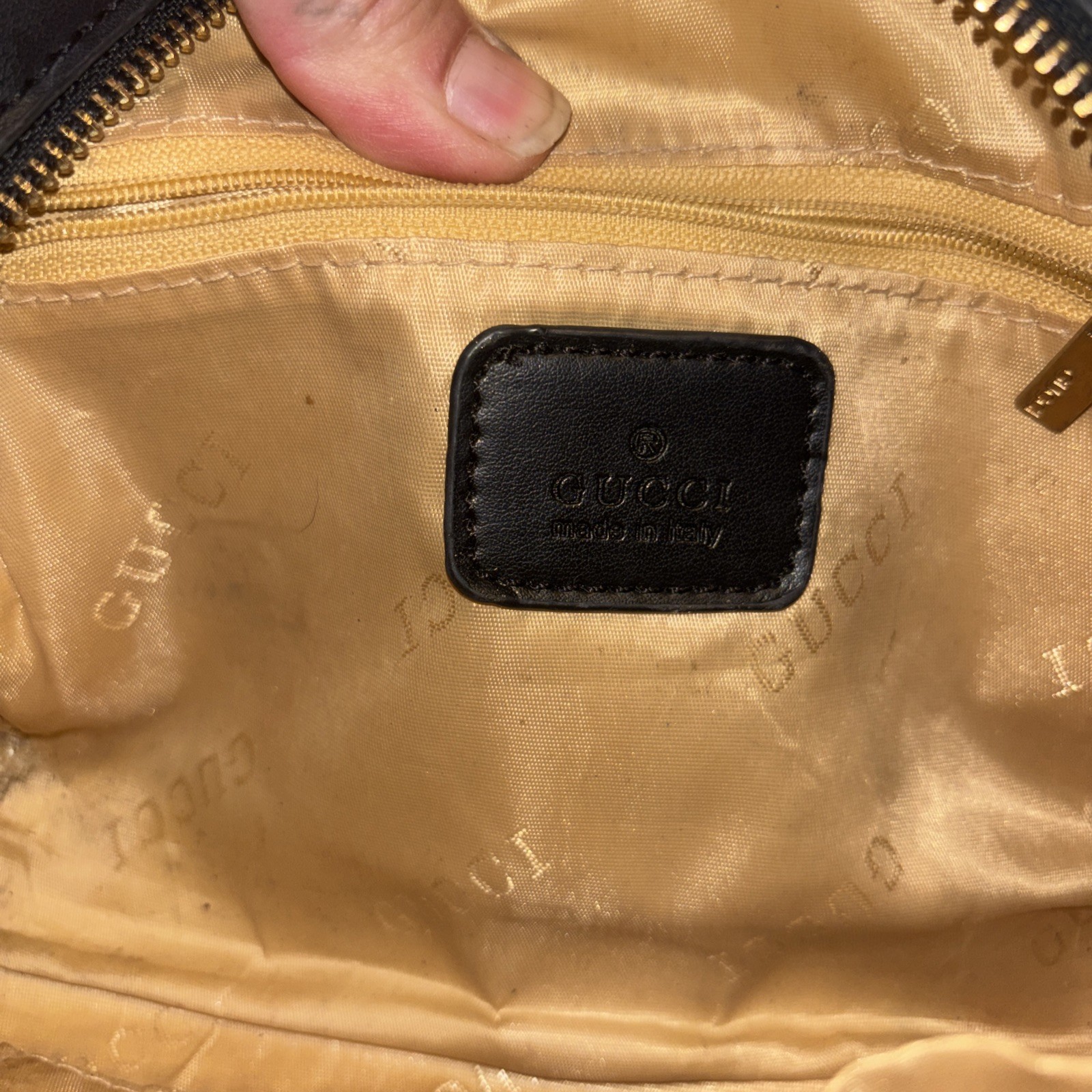This is a Gucci GG Supreme Ophidia camera-style shoulder bag.
