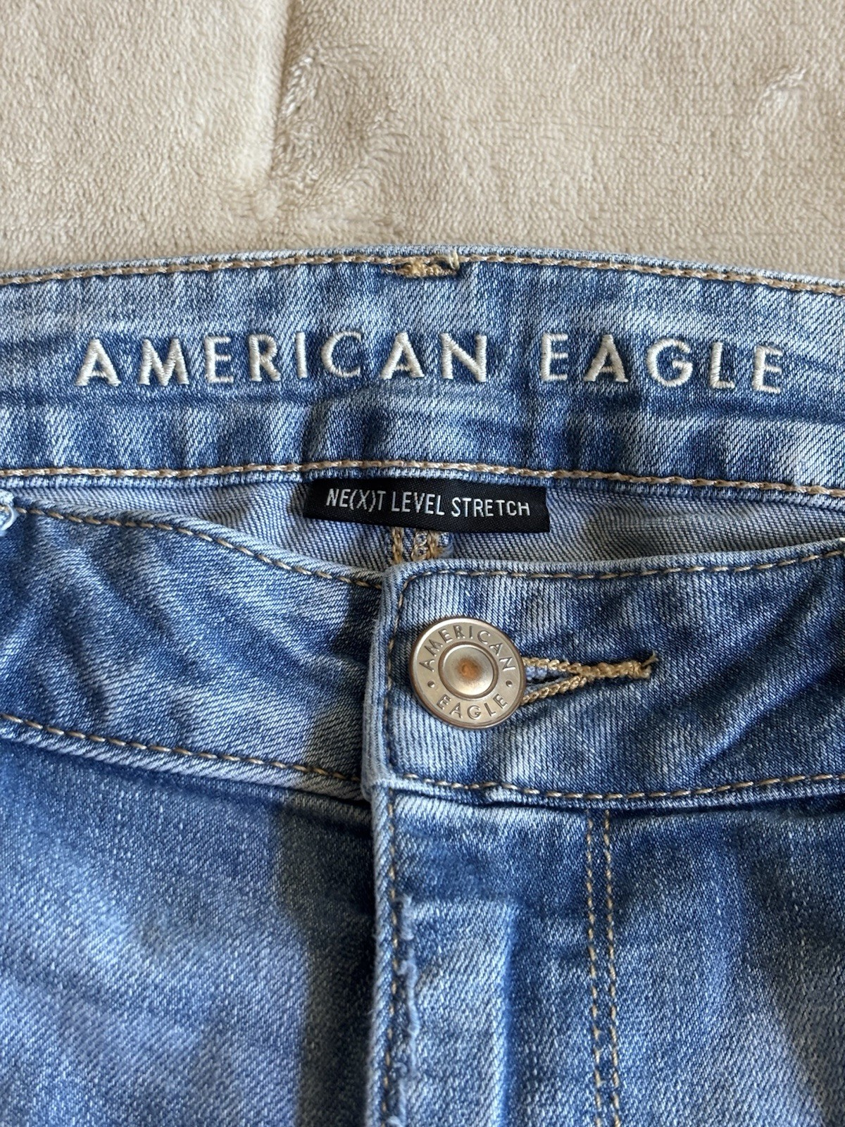 American Eagle Women’s Blue Light Wash High Rise Distressed Jegging