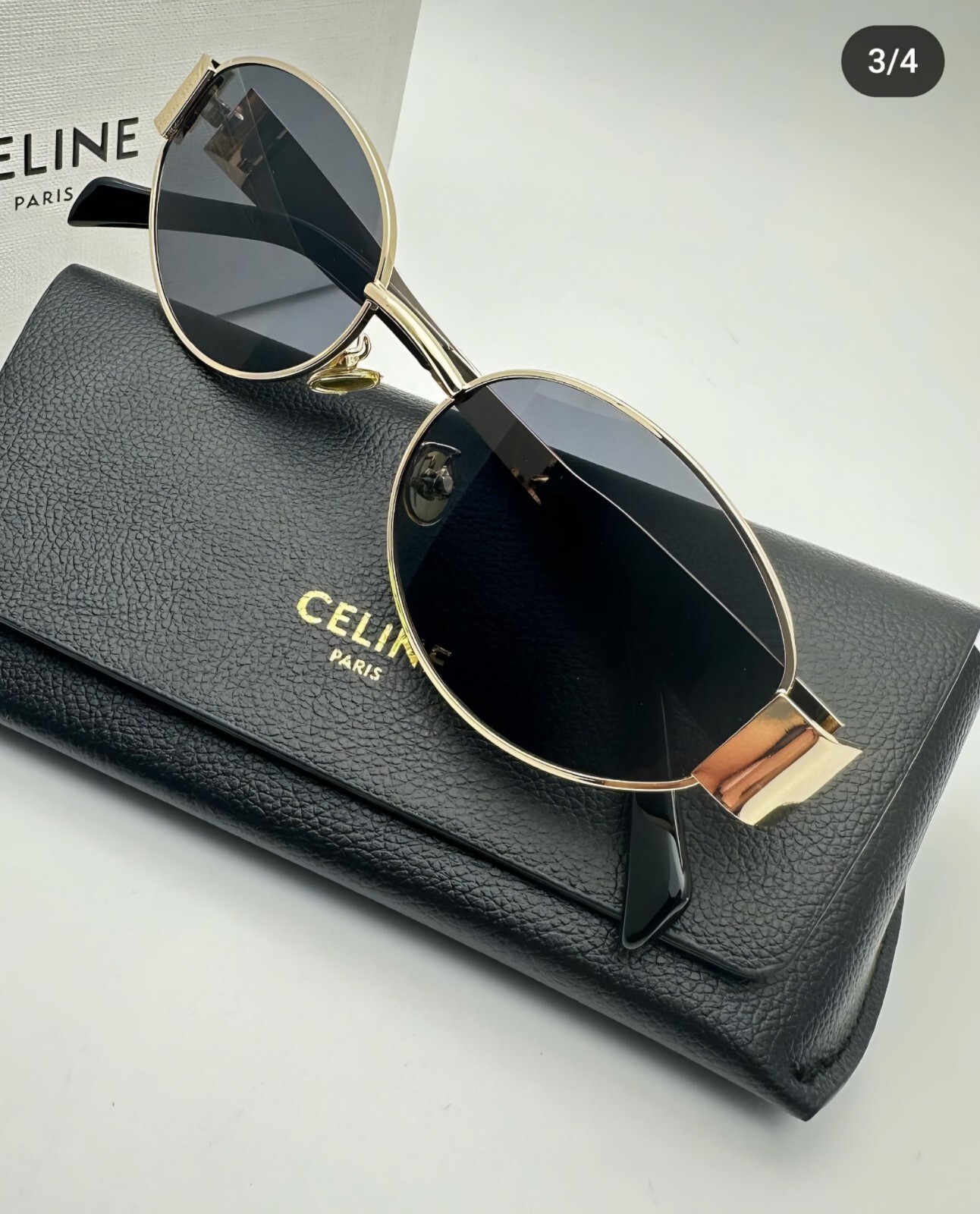 Sunglasses for women Celine Triomphe golden metal glasses. Oval.