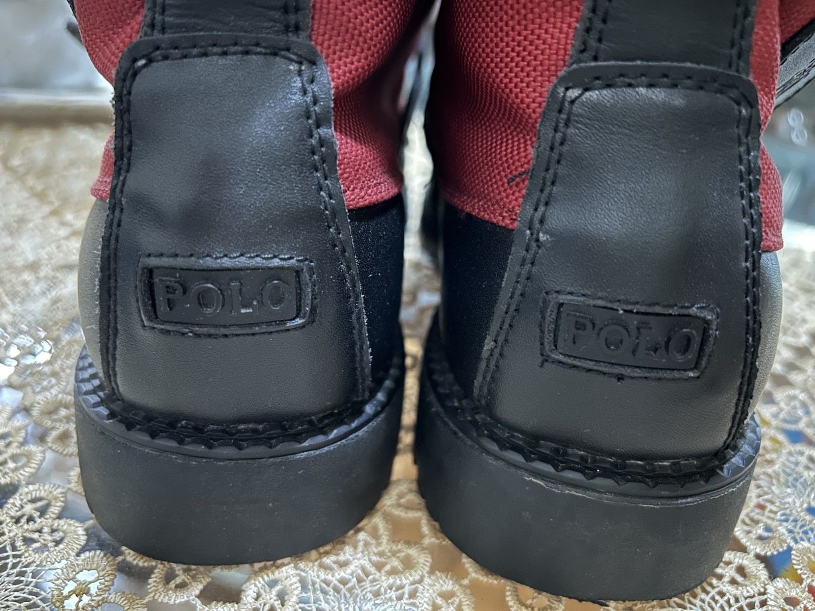 Cozy interior with red and black colors. Features Polo branding. 5/1/2