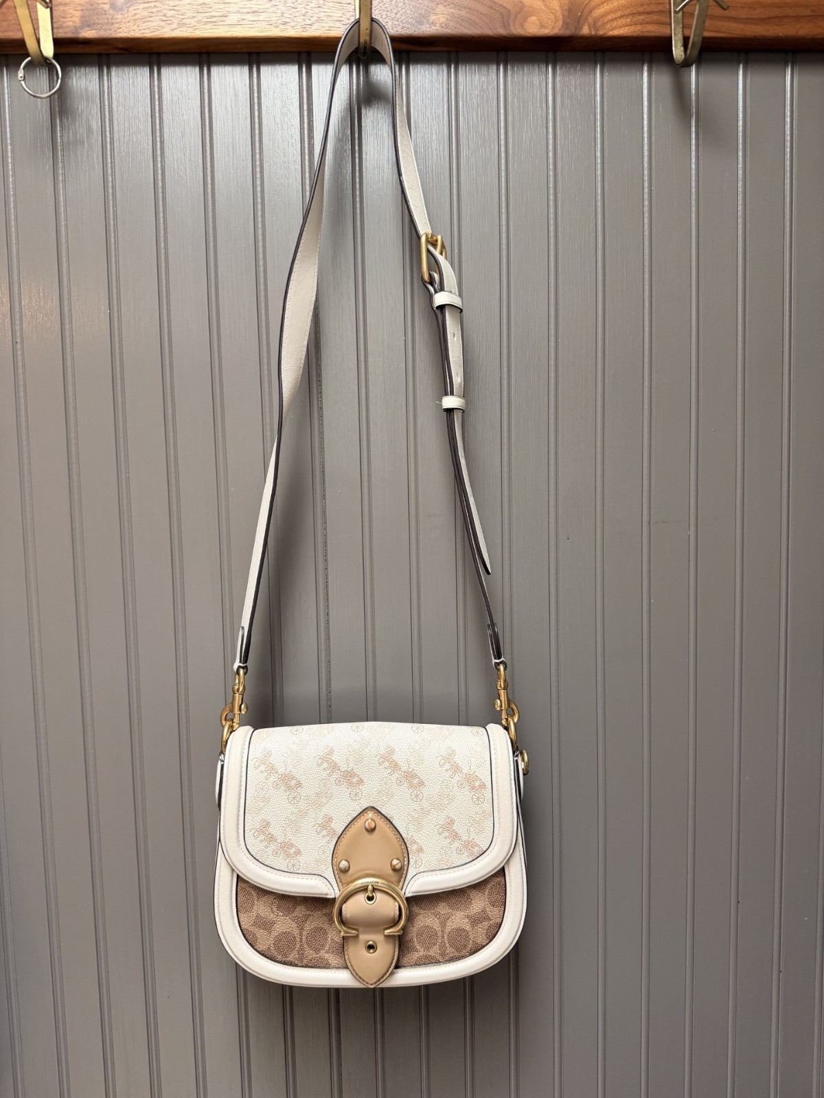 Coach Ivory and Tan cross body Beat Saddle Bag with signature canvas light used