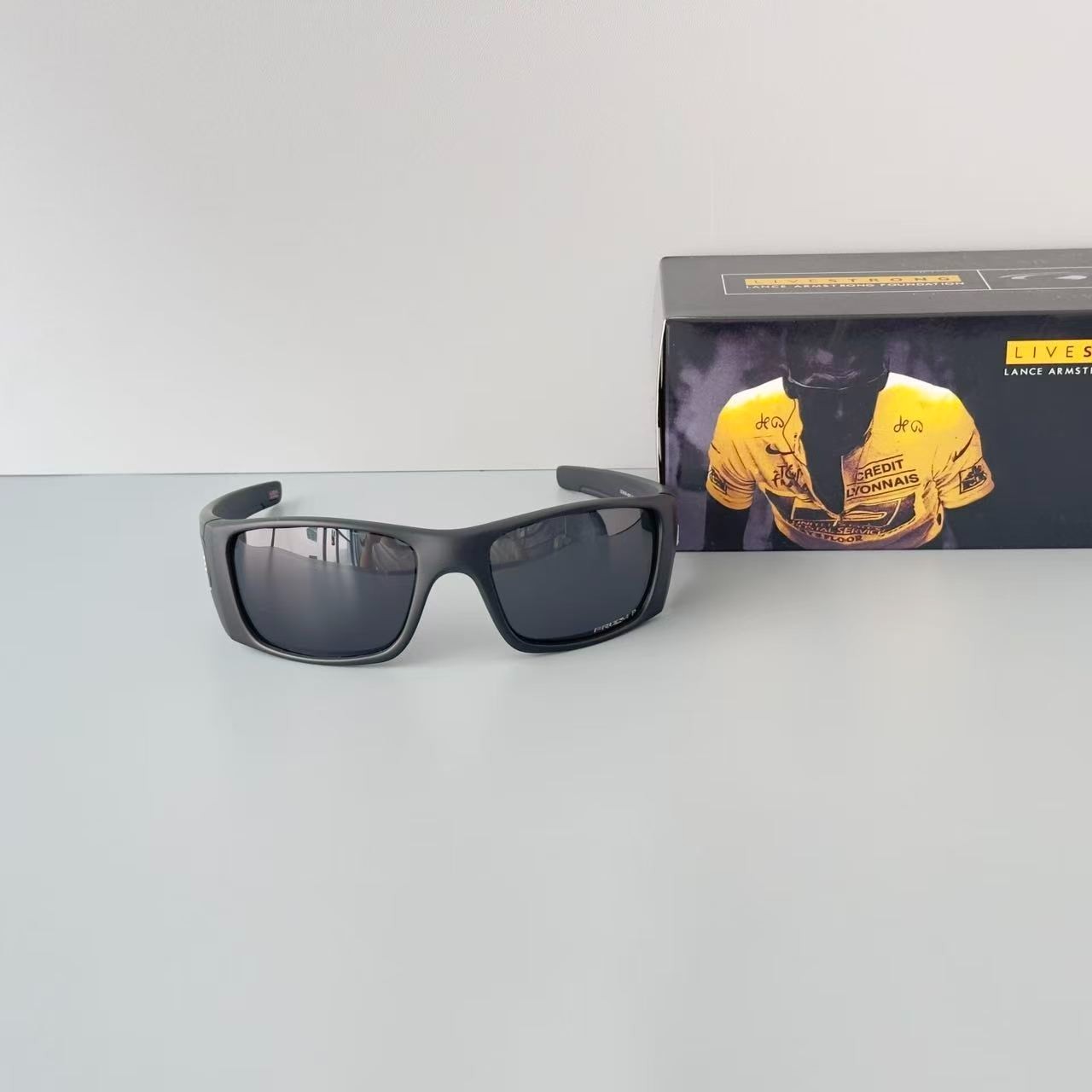 Oakley Fuel Cell OO9096 Polarized Sunglasses Black Frame Black Lens USA Flag