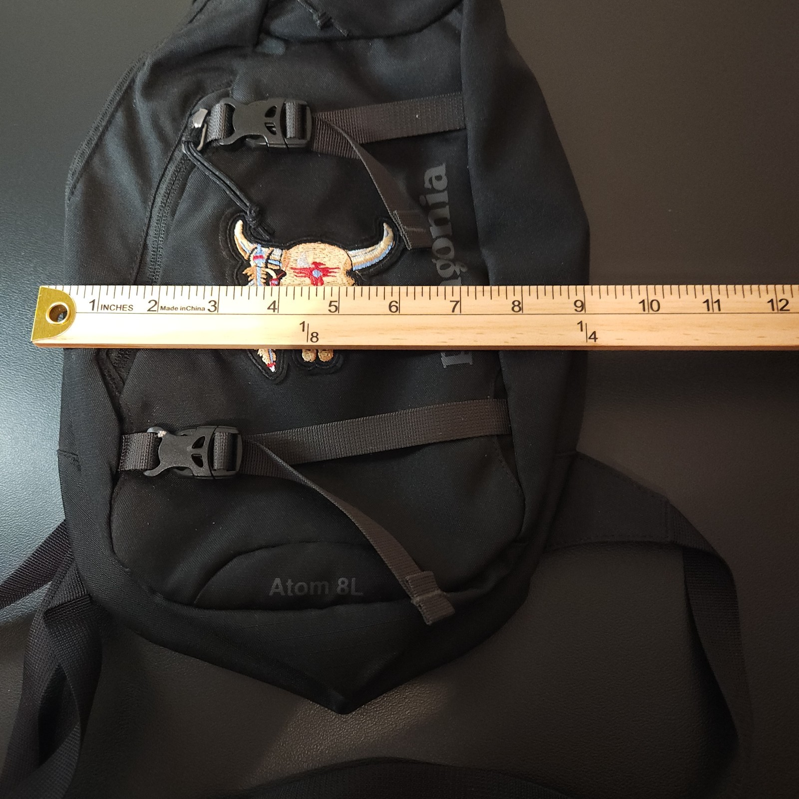 Patagonia Atom 8L Sling Bag Black Gray Crossbody Bull Skull Patch Hiking Travel