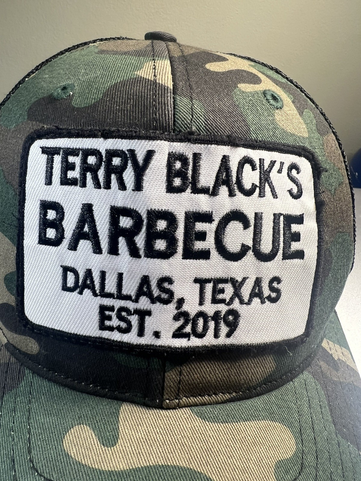 Terry Black’s Barbecue BBQ EST 2019 (not 2014) Green Camo Mesh Trucker Hat