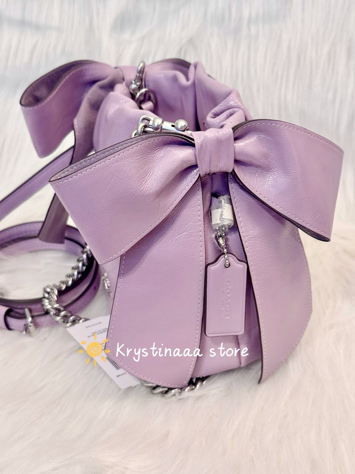 NWT Coach Faye Mini Drawstring Bag With Bows CEL03 in Light Amethyst Leather