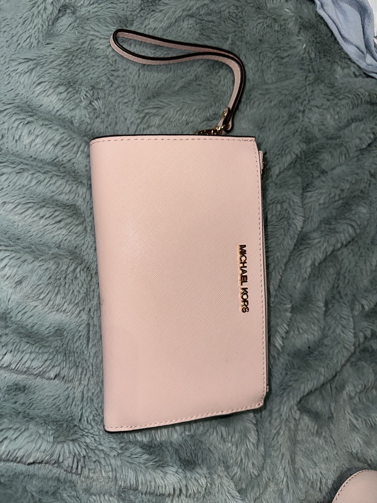 Michael Kors Pink purse with matching wallet price tags included never used