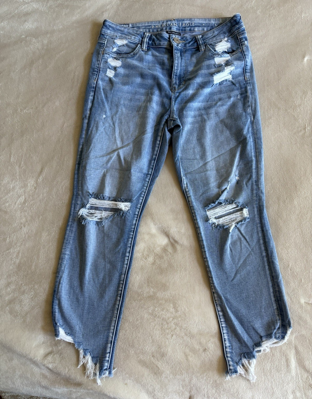American Eagle Women’s Blue Light Wash High Rise Distressed Jegging