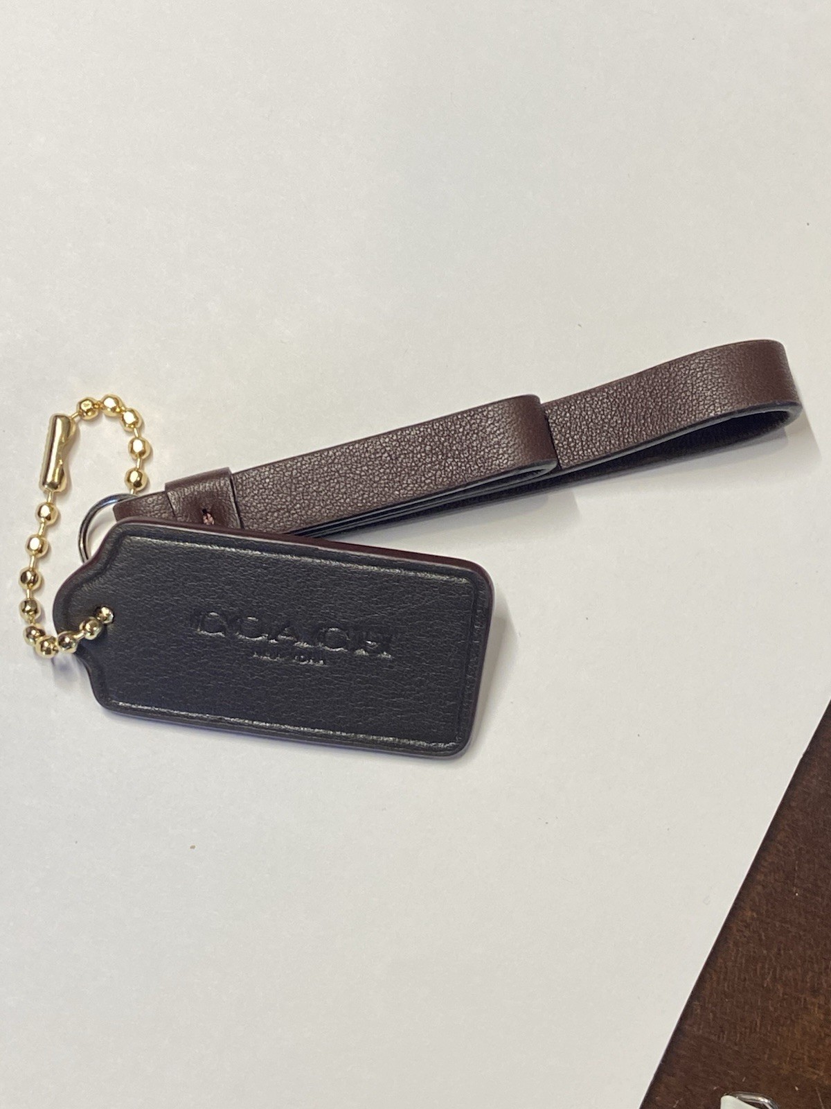 COACH Leather Wristlet Strap & Hang Tag Charm Dark Brown Black Gold (Never use)