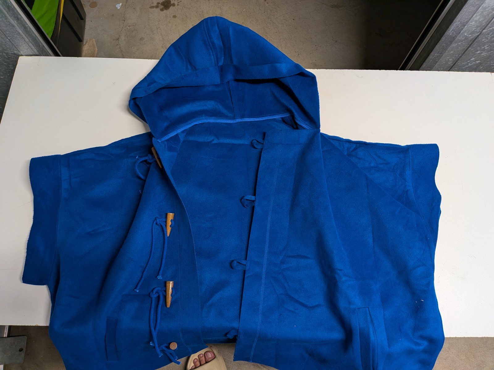 thick blue poncho
