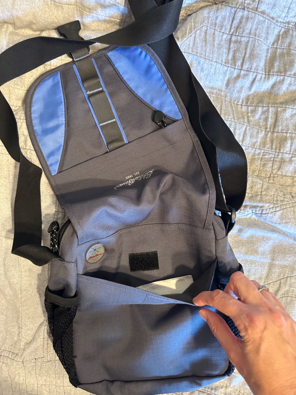 NWT Eddie Bauer cross body bag blue and black with multiple compartments.