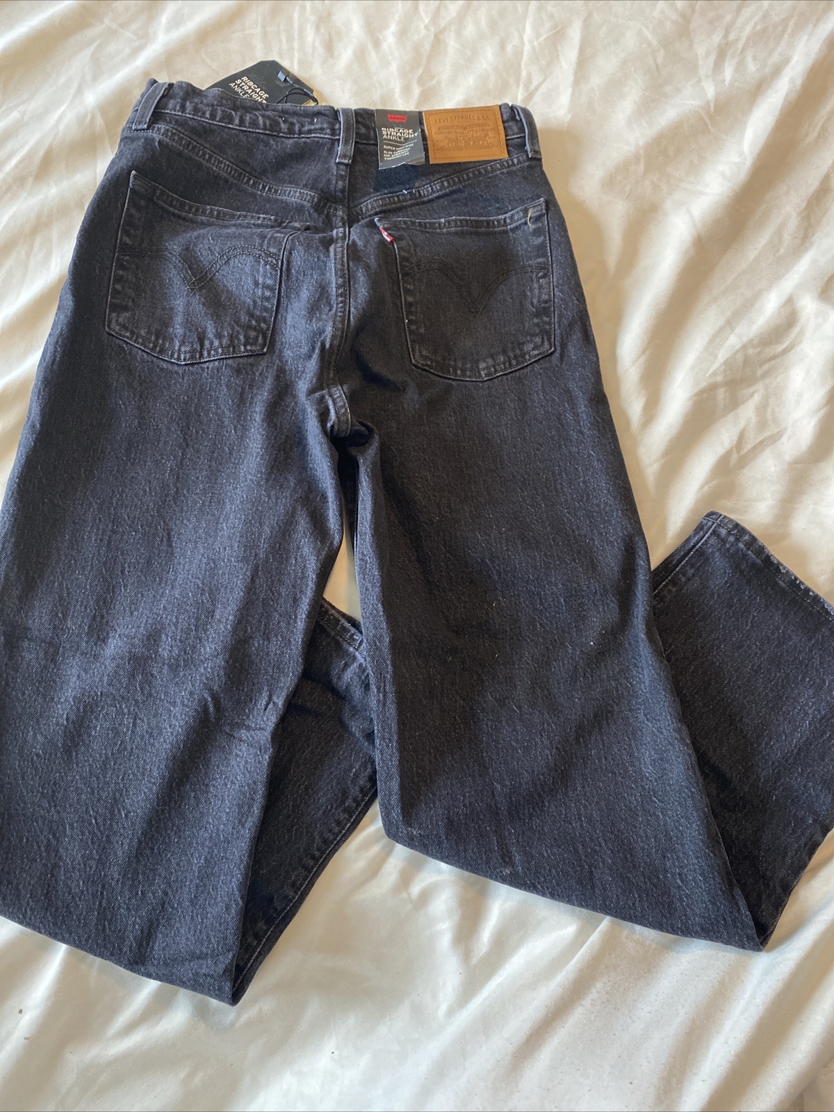 Levi’s women’s black jeans high rise straight leg size 27X27 $98