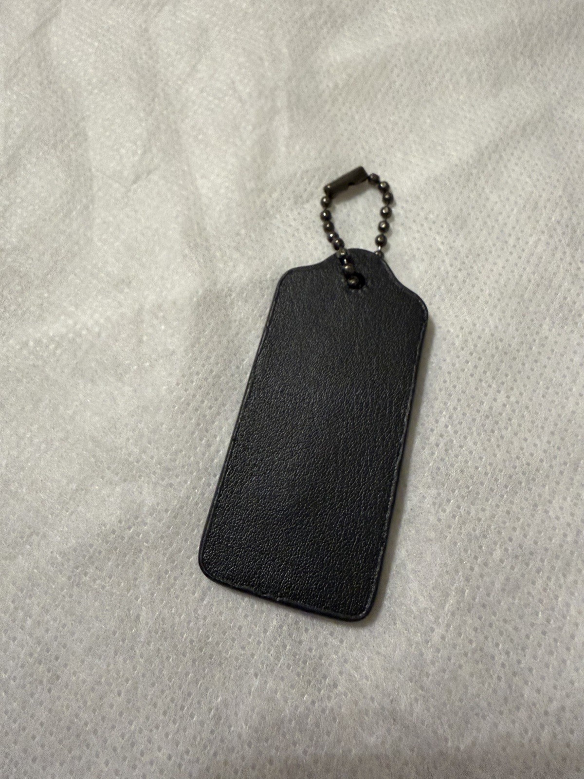 Coach Hang Tag