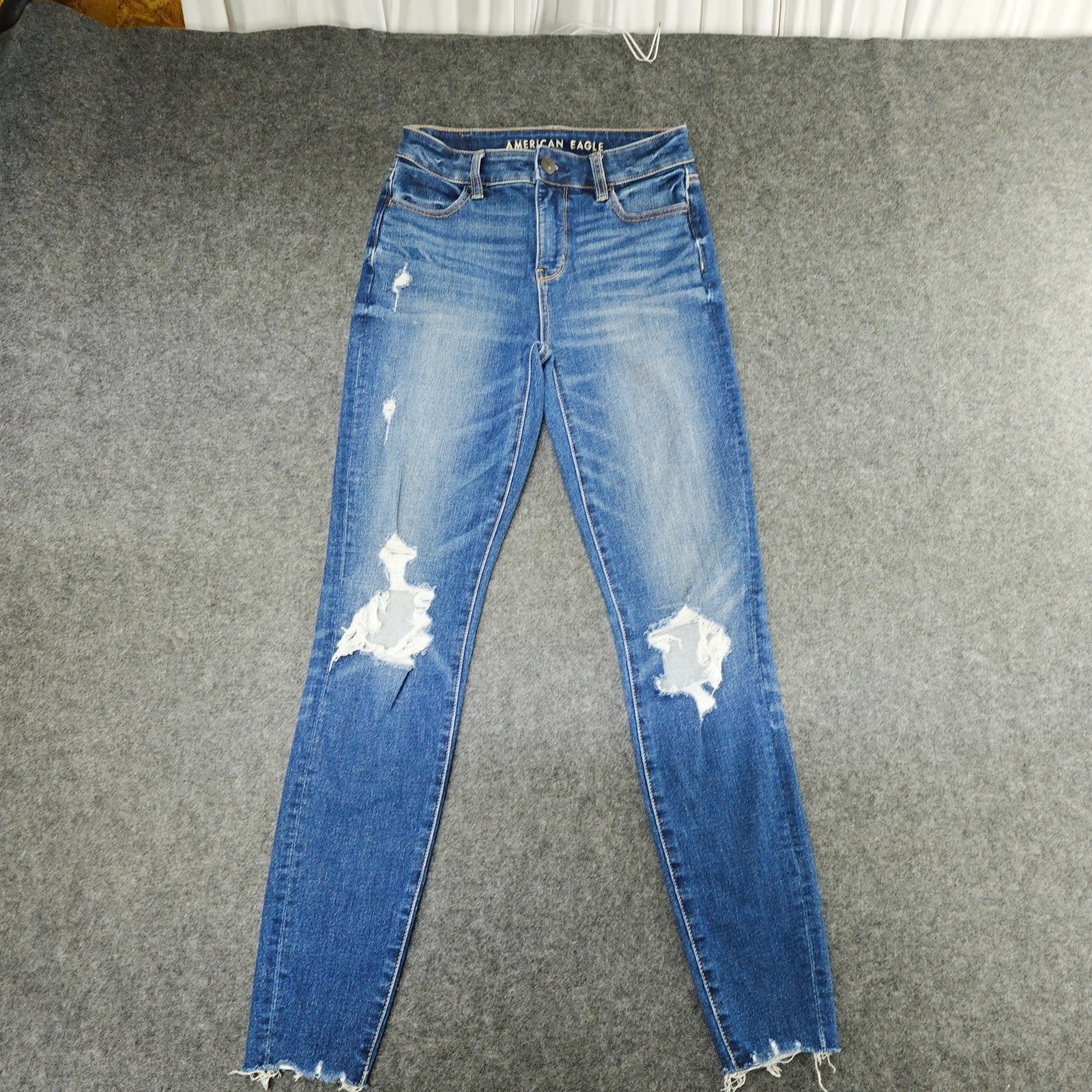 American Eagle Hi-Rise Jegging Distressed Ripped Raw Hem Blue Wash Jeans