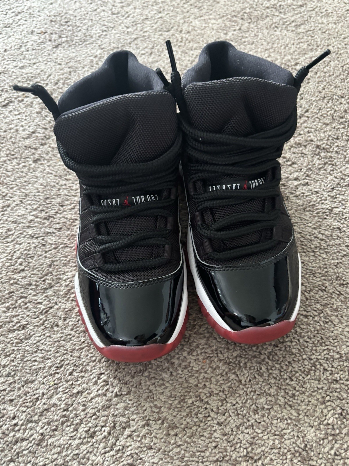 Jordan Air Jordan 11 Retro Mid Top Lace-Up Sneaker Black/Red/White 378038-061