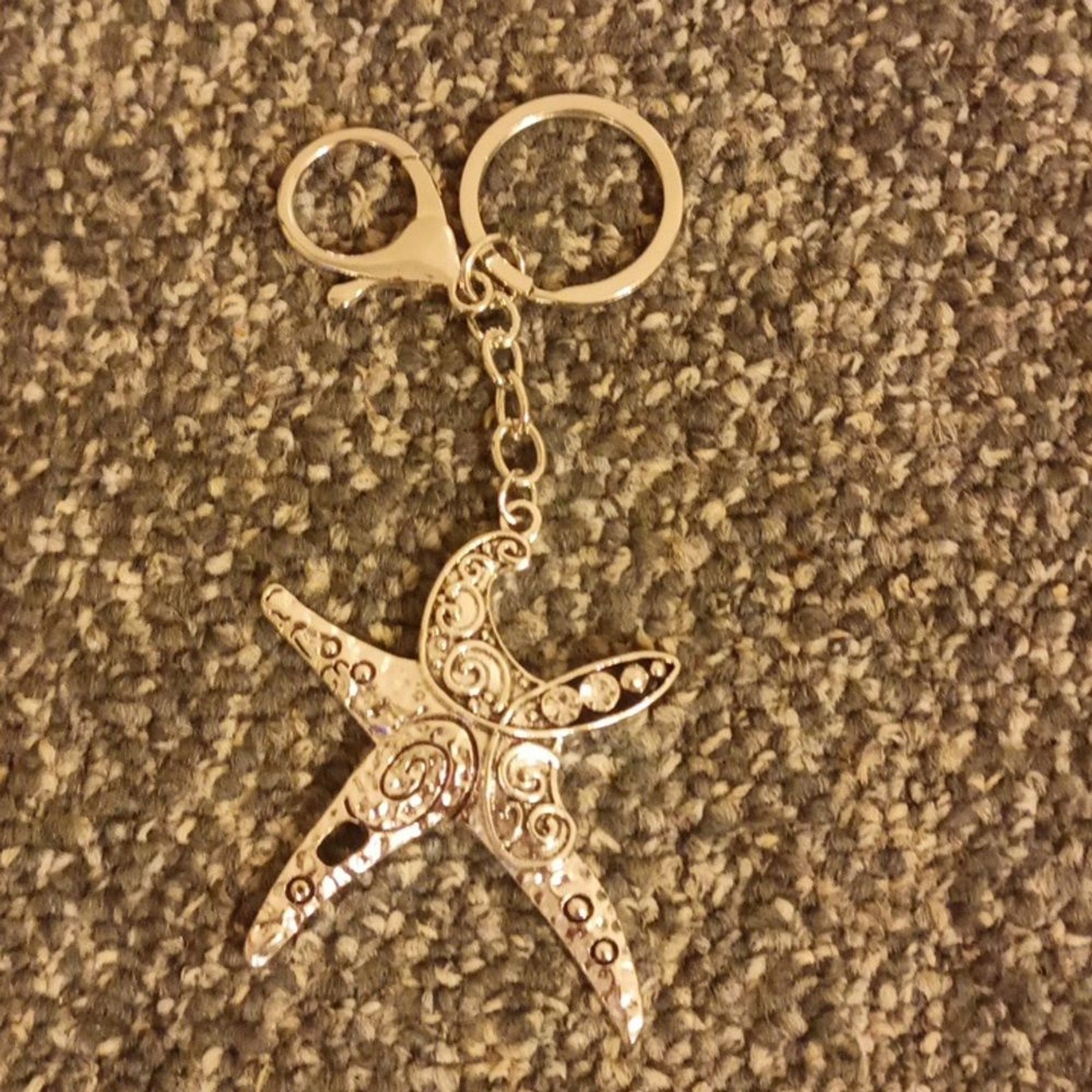 Starfish silver tone keychain with bling