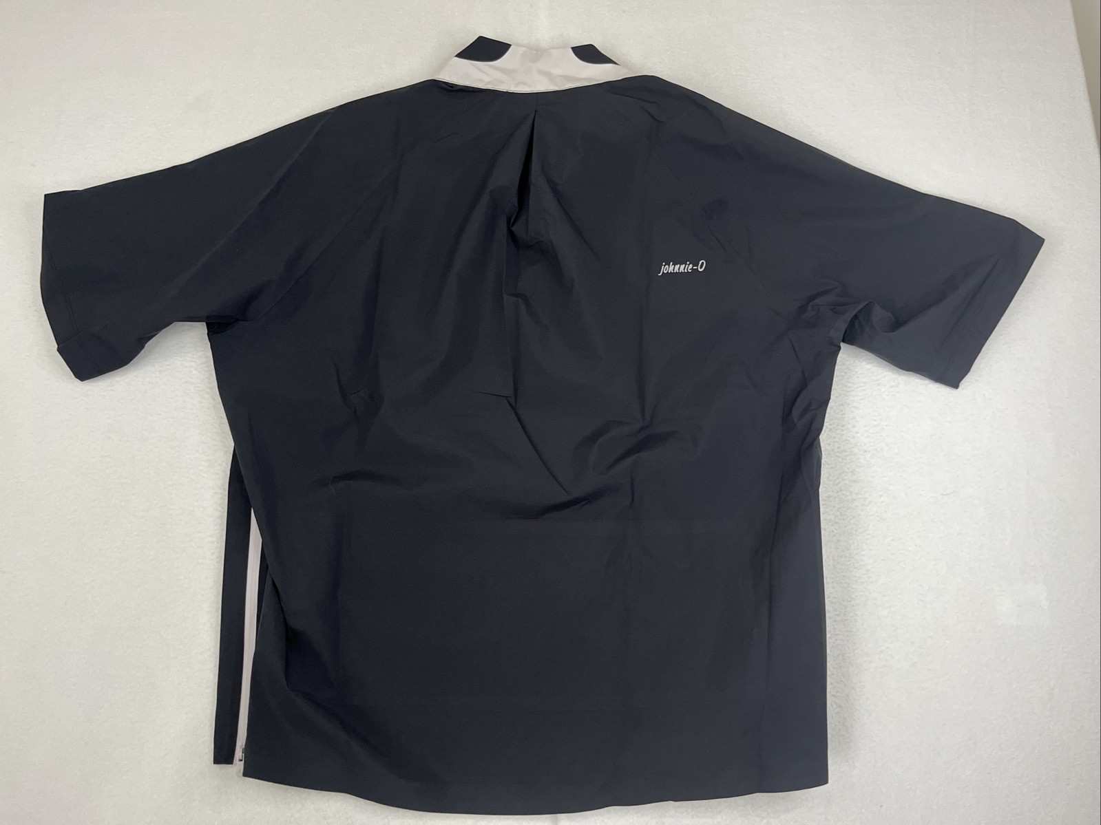 JOHNNIE-O STEALTH STOWABLE SHORT SLEEVE GOLF JACKET SZ L PURDUE BLACK