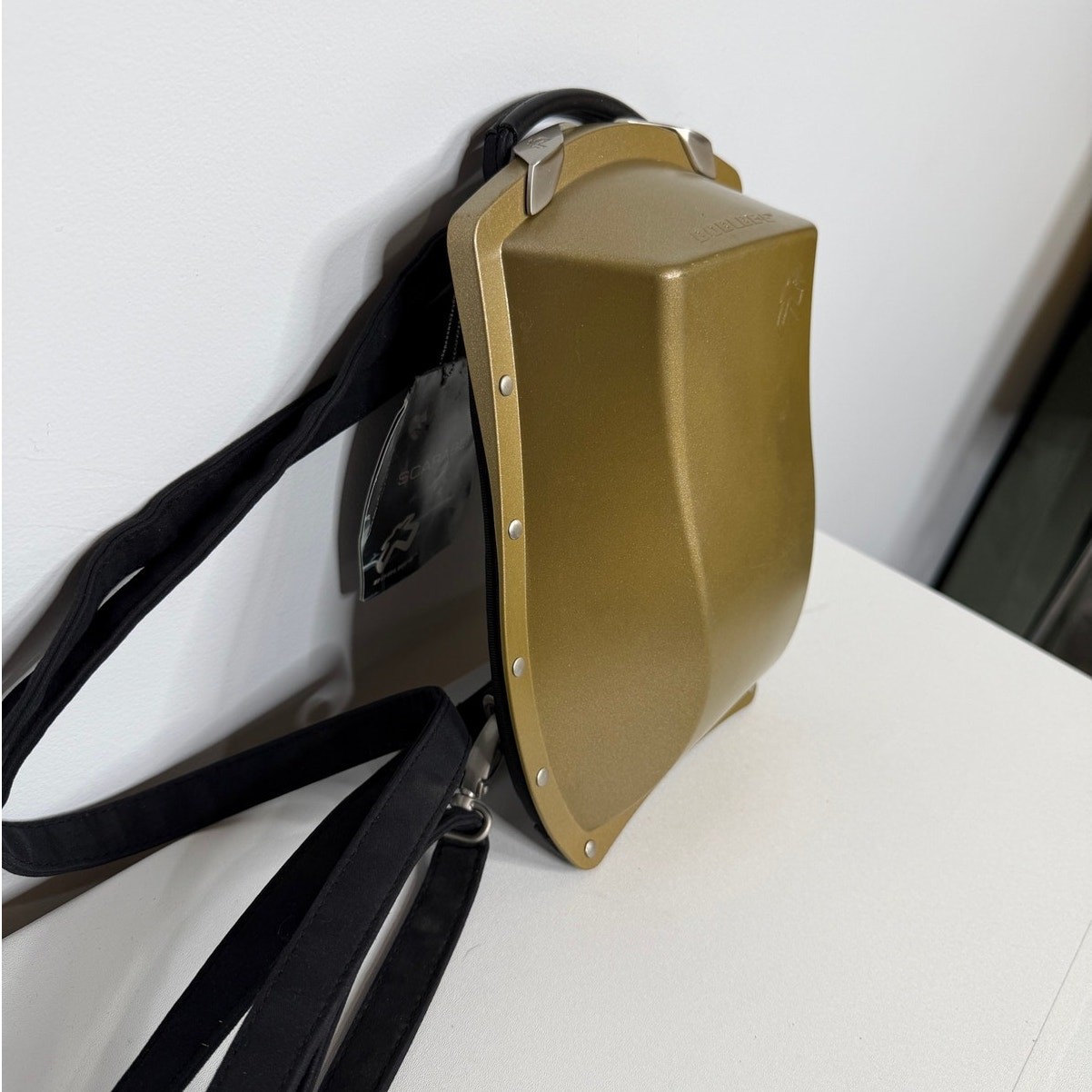 Boblbee Scarabée hard-shell mini backpack St Tropez model in metallic gold.