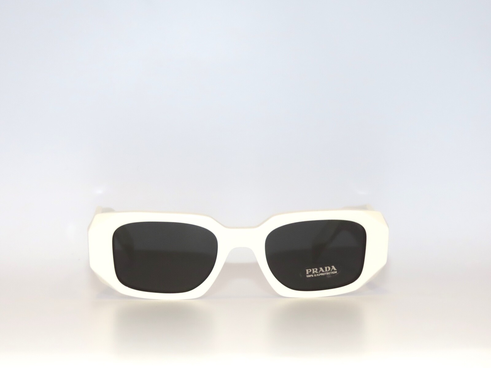Prada SPR17WS 17 1425S0 Talc Dark Gray Sunglasses 17W