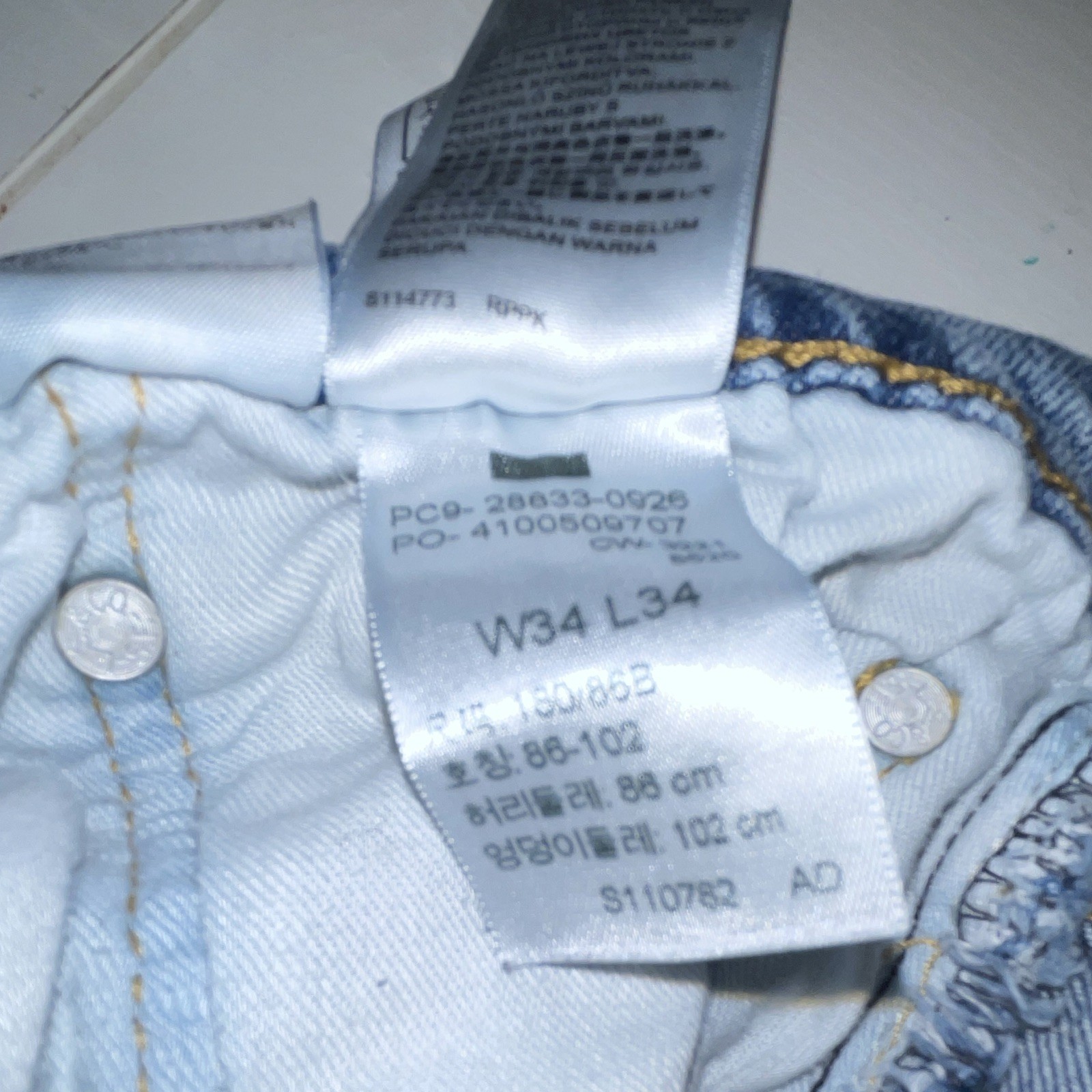 Levi Strauss & Co Men’s Blue Slim Straight Light Wash Distressed Denim Jeans