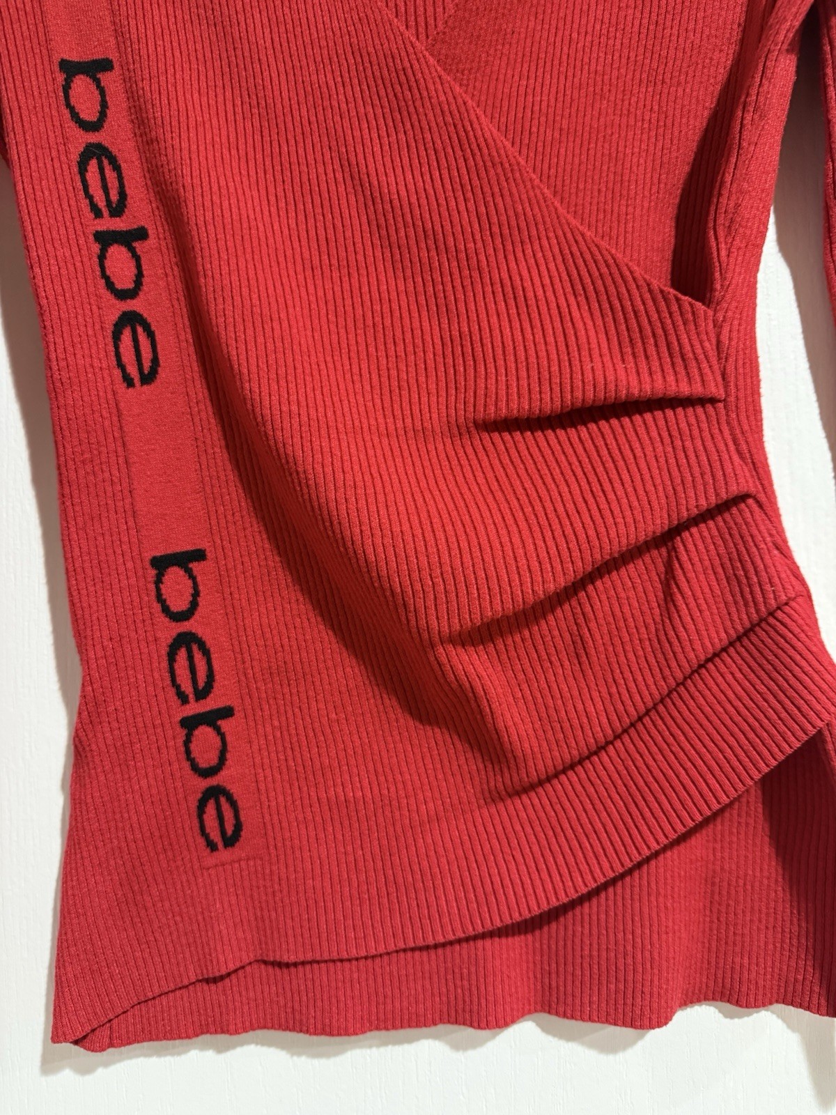 BEBE Red Asymmetric Side LOGO Faux Wrap Ribbed Knit V Neck Sweater Size Small