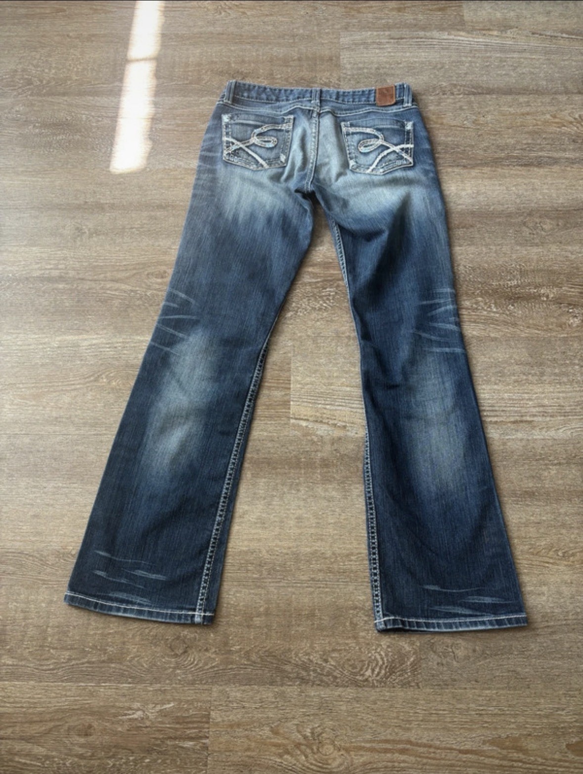 Y2K VTG BKE blue low rise bootcut flare jeans with white stitching back pockets
