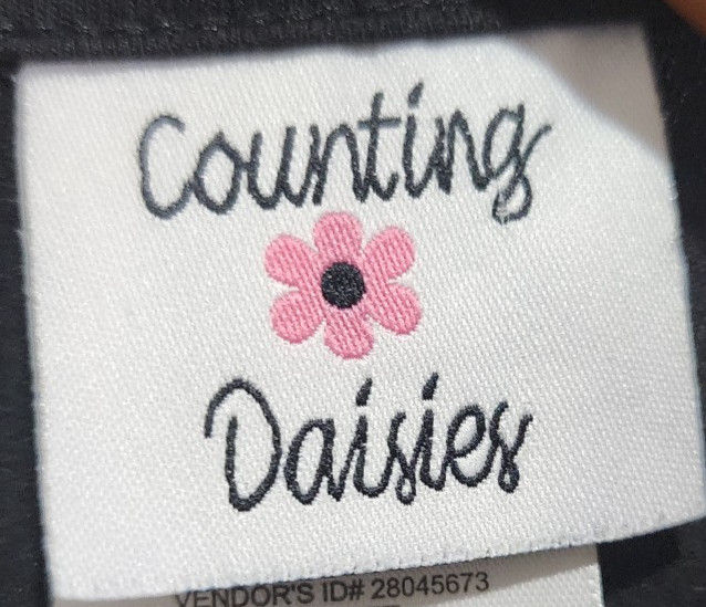 Counting Daisies girls 7 – 8 Black Hocus Pocus dress. Colorful sequins