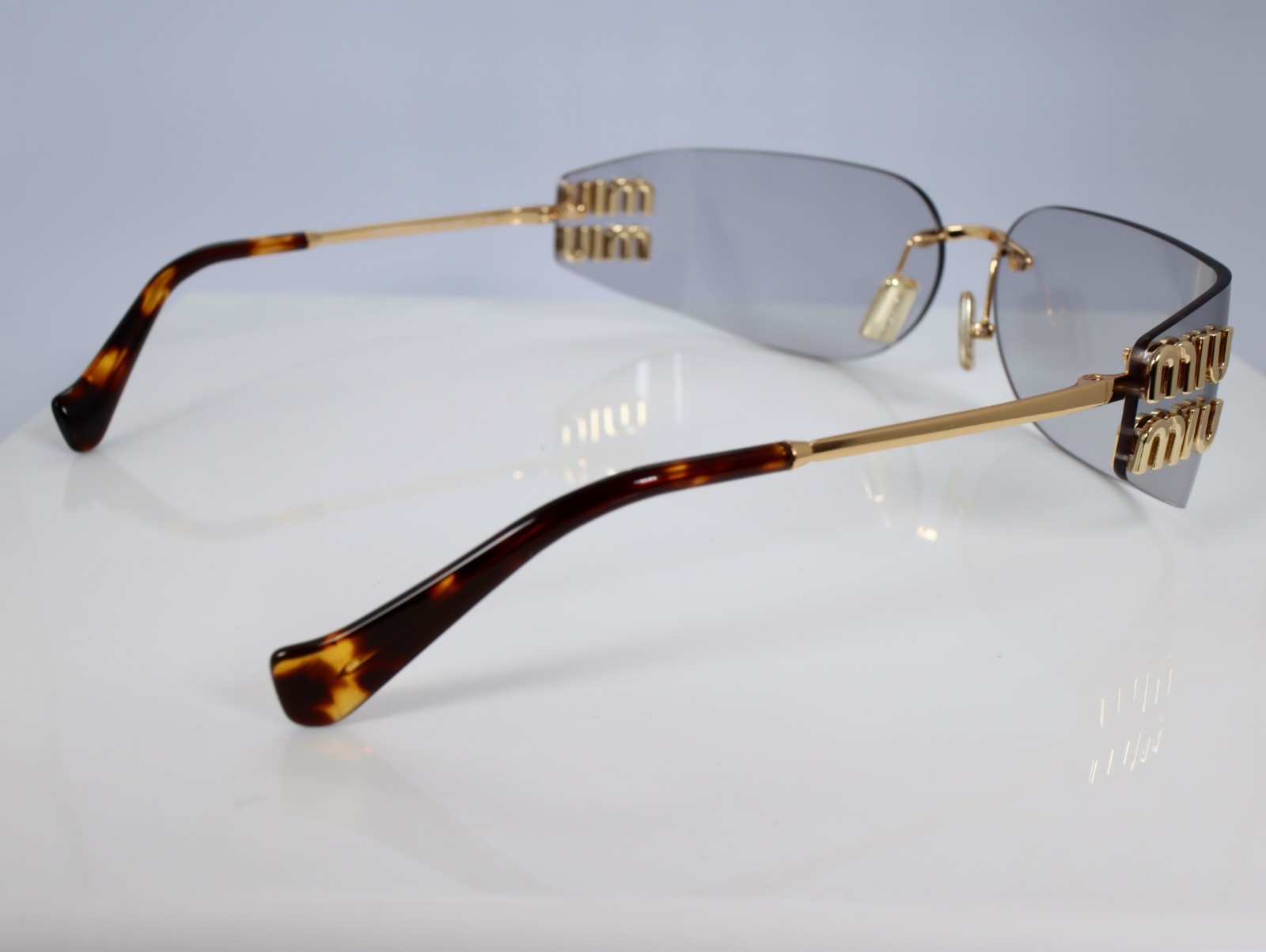 Miu Miu MU A51S 5AK50K 75mm Rectangle Sunglasses in Gold with Light Gray Lenses