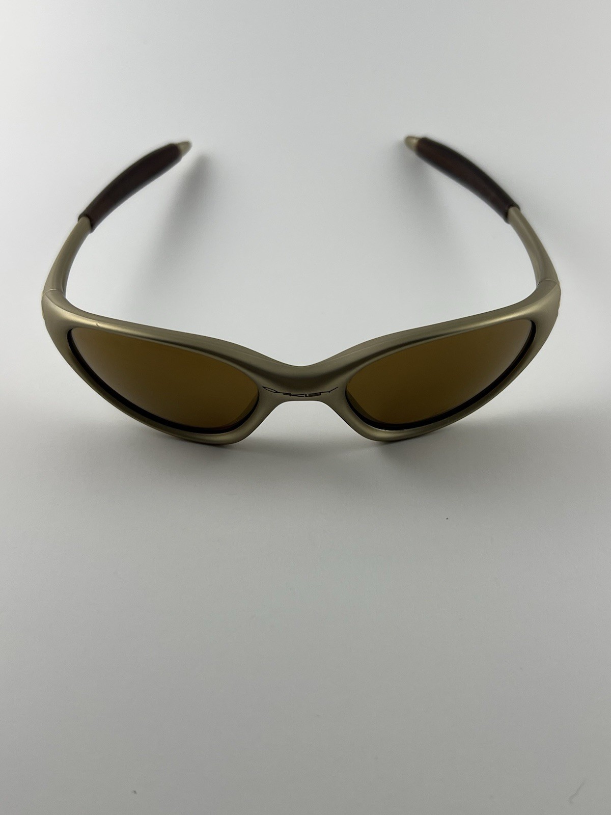 Oakley Minute 1.0 FMJ Platinum Frame Gold Iridium Lens Rootbeer Ear 04-082 XX