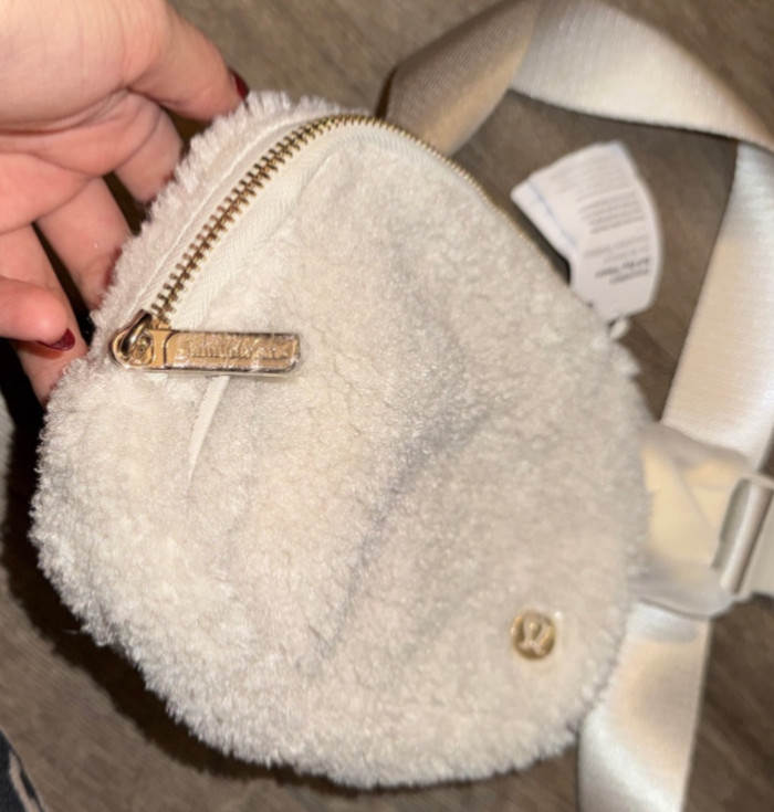 lululemon everywhere crossbody bag 2l. Furr bag great for fall or winter.